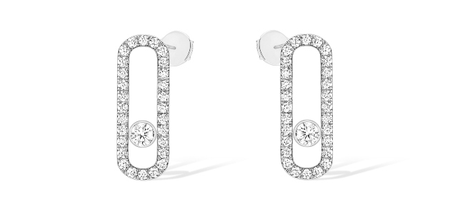 A pair of Messika pavé-set white gold earrings, available at Kirk Jewelers.