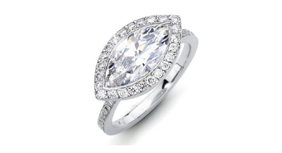 a marquise cut engagement ring with an east west orientation and halo setting